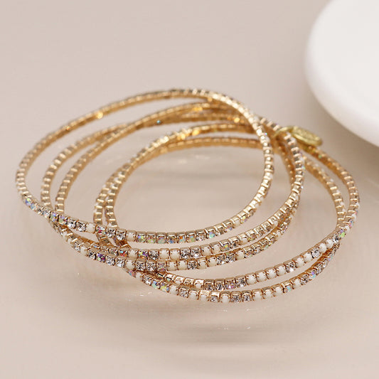 Golden multistrand cream mix crystal bracelet stack